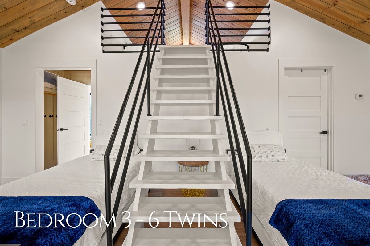 This room with twin beds is perfect for kids or friends, offering a comfortable and flexible setup that works for any group.