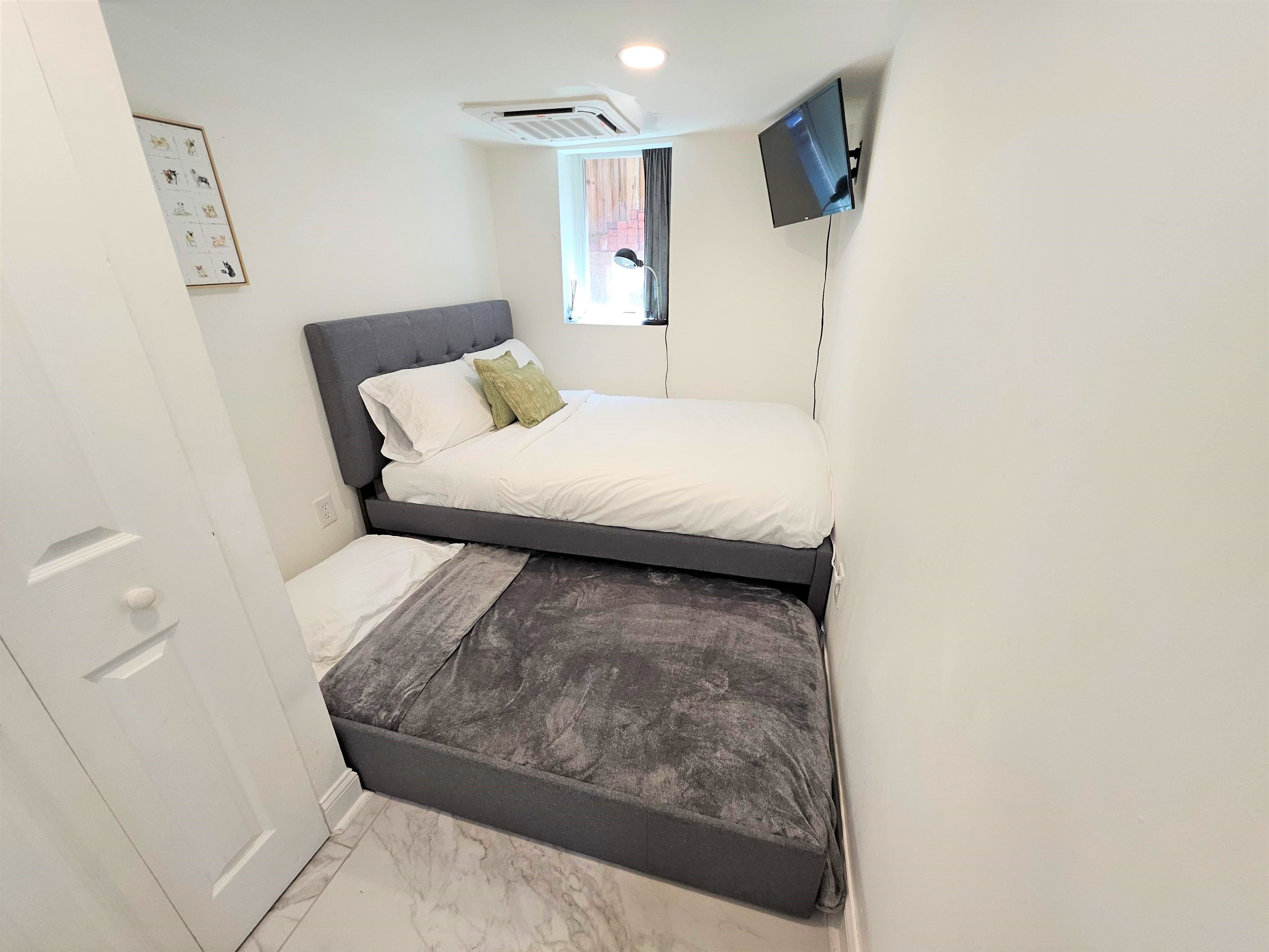 When the trundle bed is pulled out for use, the beds will take up the majority of the room