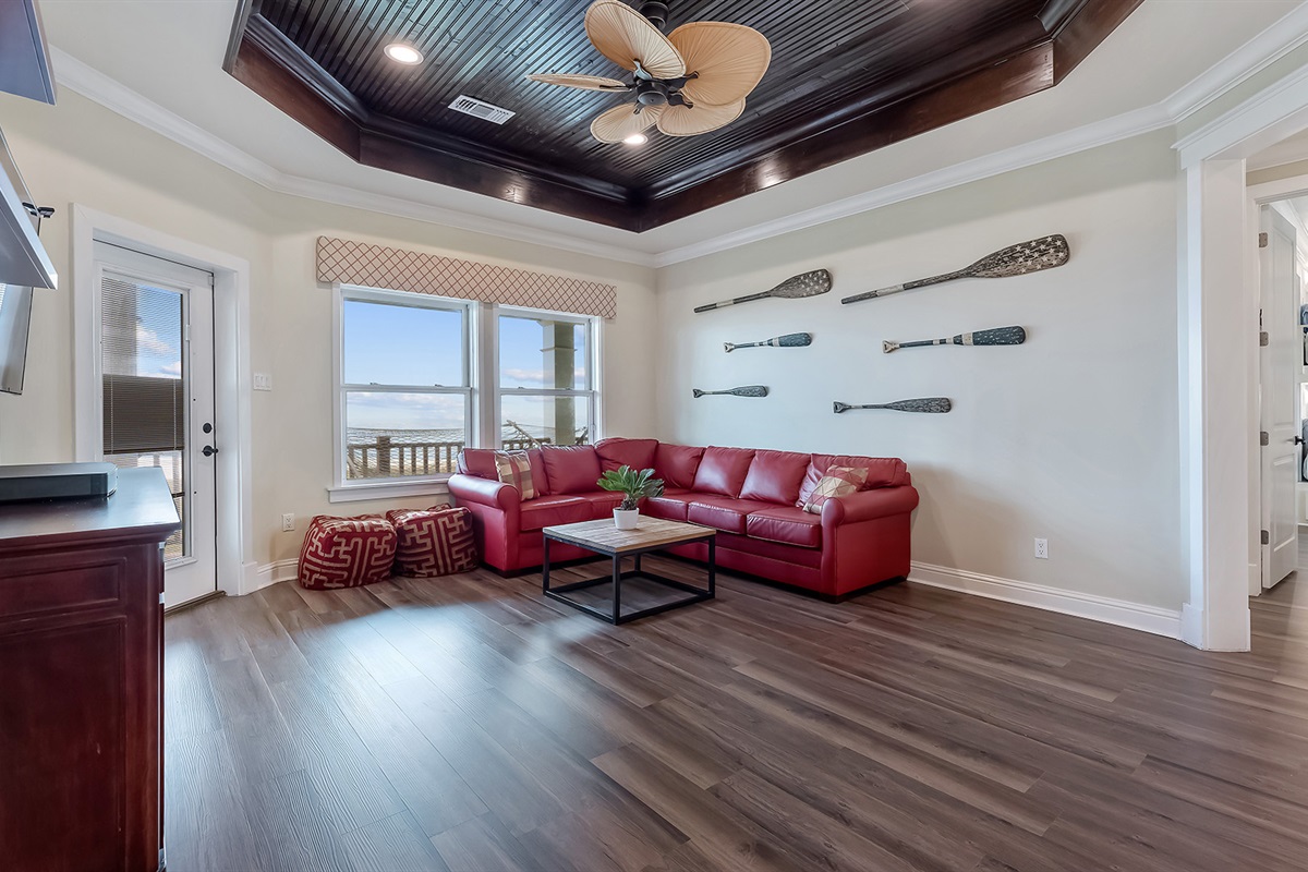2nd Floor Living Room: Comfortable leather couches and an open floor plan for activities.