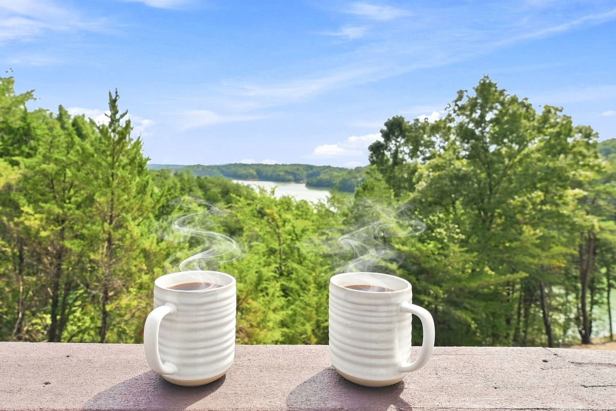 Start the morning with coffee, hummingbirds, and a peaceful Douglas Lake view from the front porch.