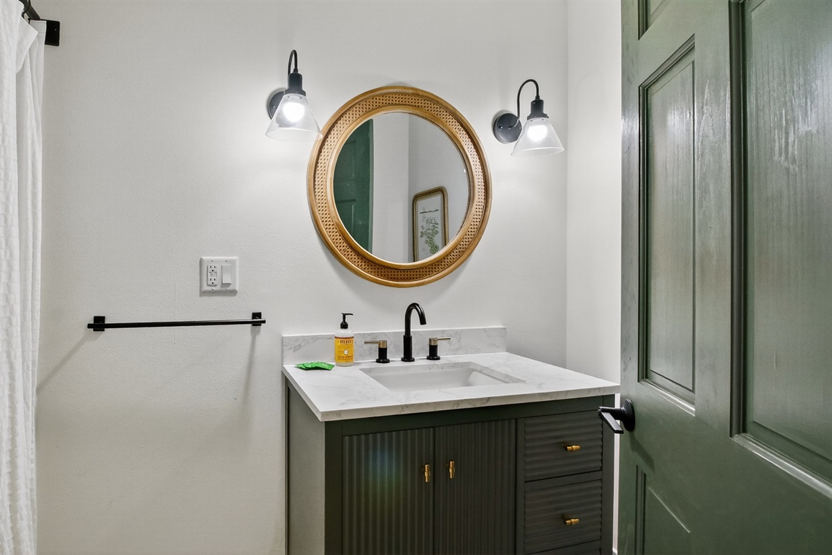 The home has two bathrooms. The main full bathroom has a shower/tub combination.