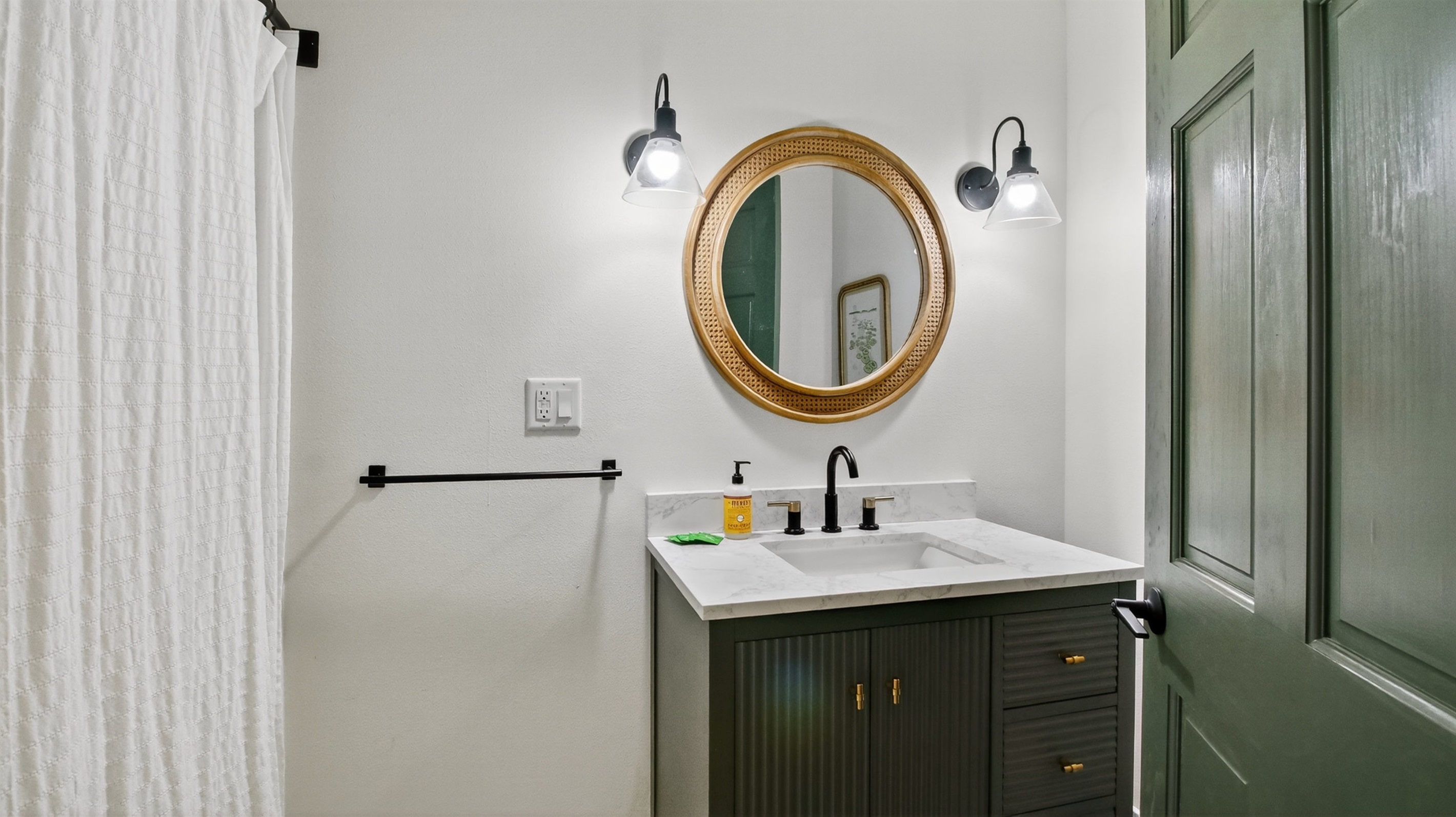 The home has two bathrooms. The main full bathroom has a shower/tub combination.