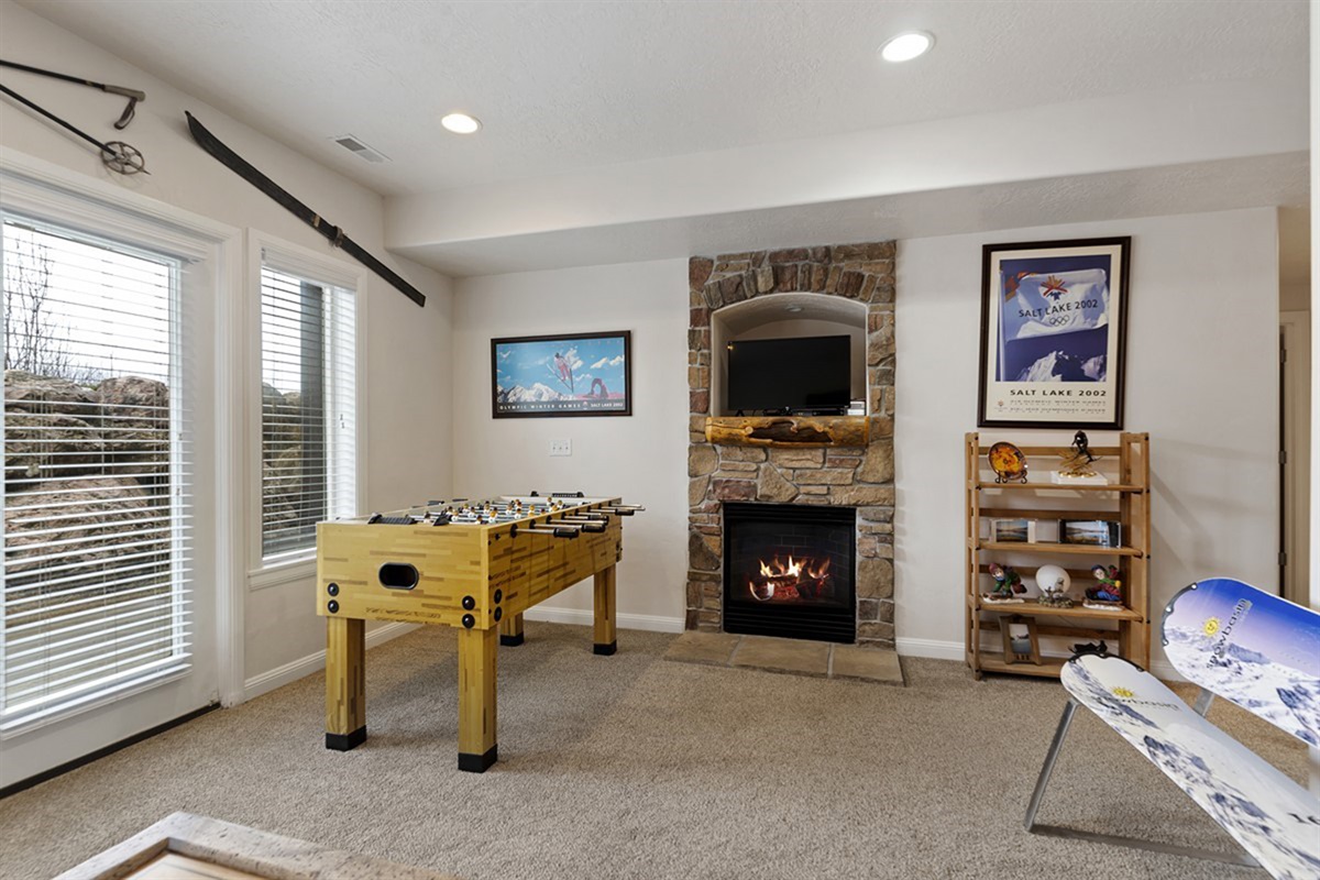 Challenge friends and family to a game of foosball or relax by the fire.