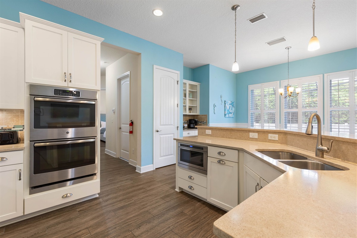 Whip up a big beach breakfast, pour drinks while dinner’s in the oven, and let the day unfold around the island—this bright, spacious kitchen makes it easy to cook together, linger longer, and feel right at home.