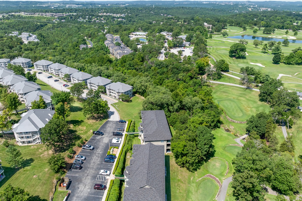 Final aerial gives one last sense of the quiet, wooded golf-resort setting around the building.