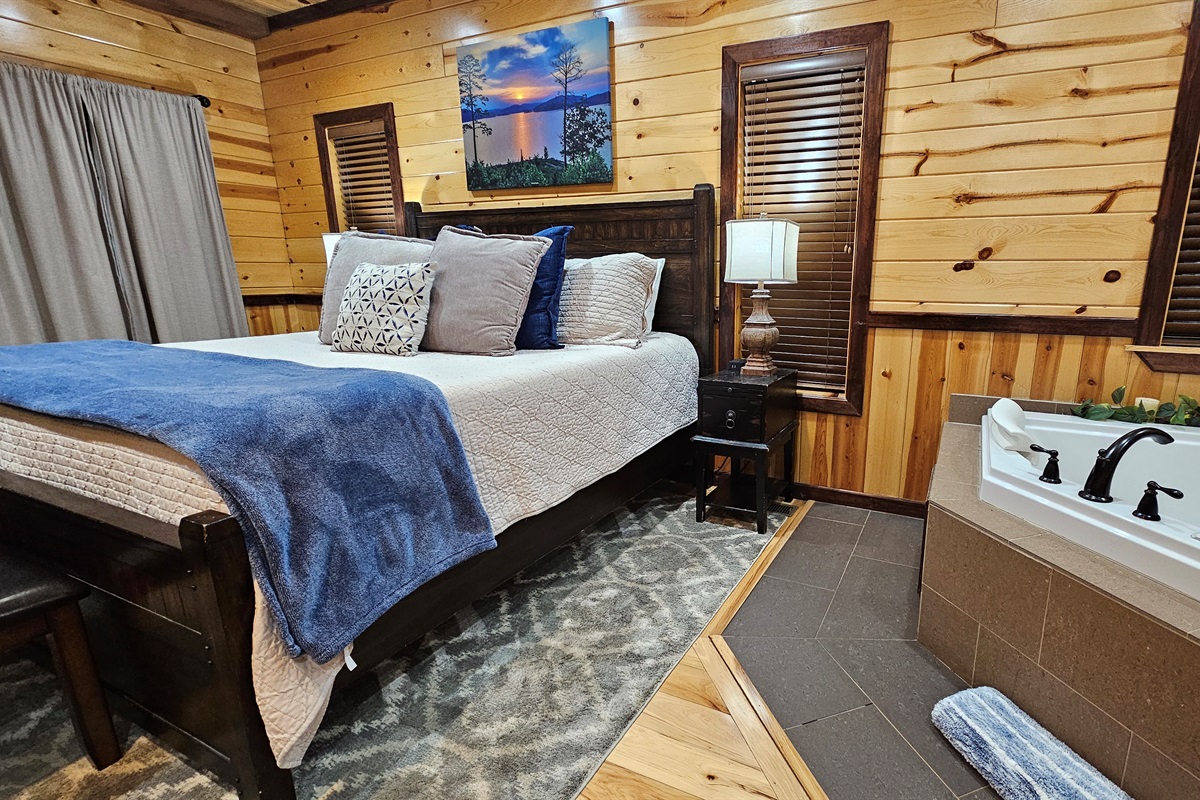 King bedroom with spa‑style jetted tub—perfect for a romantic, end‑of‑day unwind.