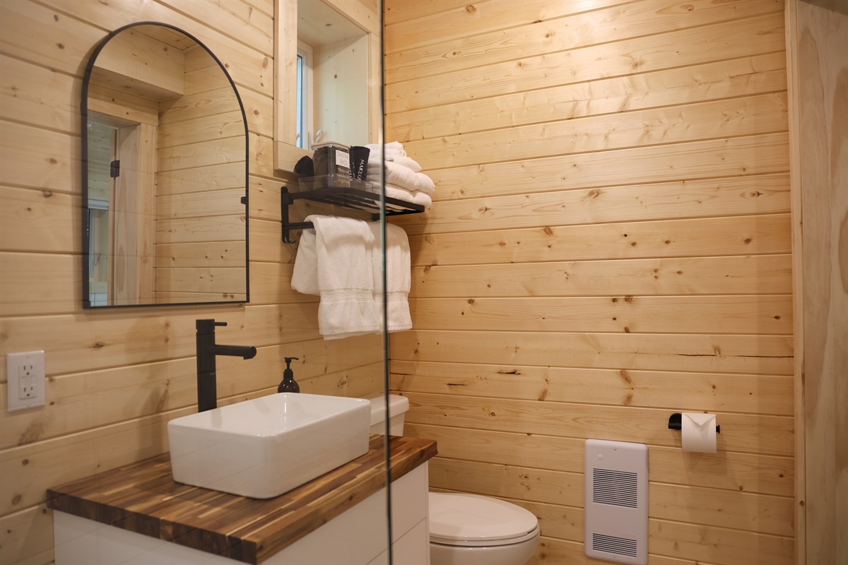 Premium bathroom with standing shower and non-toxic, Canadian made soaps by Oneka