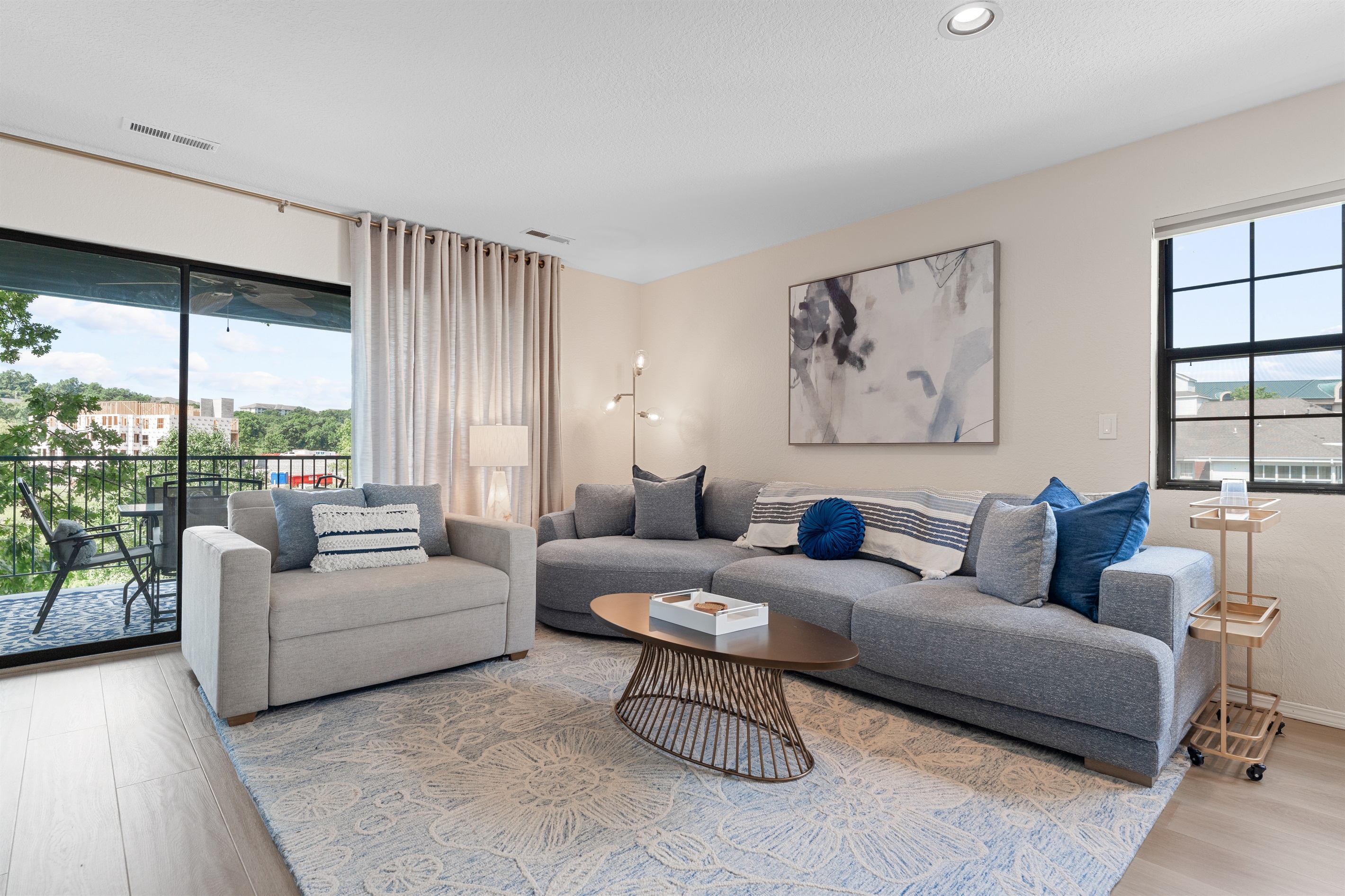 🛋 Welcome to The Midcentury—a stylish, walk-in level condo with a spacious open floor plan, midcentury-modern flair, and serene views from every angle.