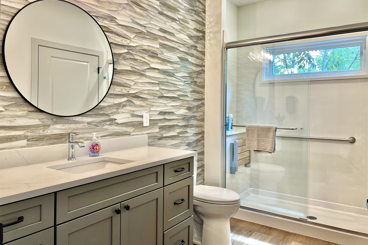 Relaxing main level bathroom with hallway access