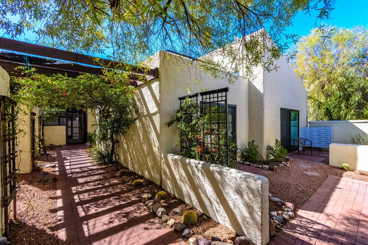 Welcome to your stay! Enjoy a break from the desert sun with this shaded entry.