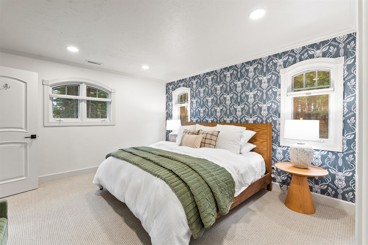 Upstairs bedroom #1 - calm, cozy, and full of light.