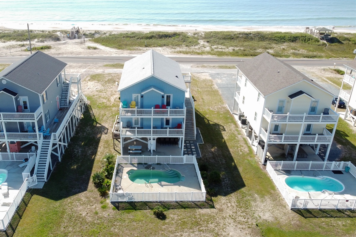 Beautiful homes share the ultimate beachside pool retreat