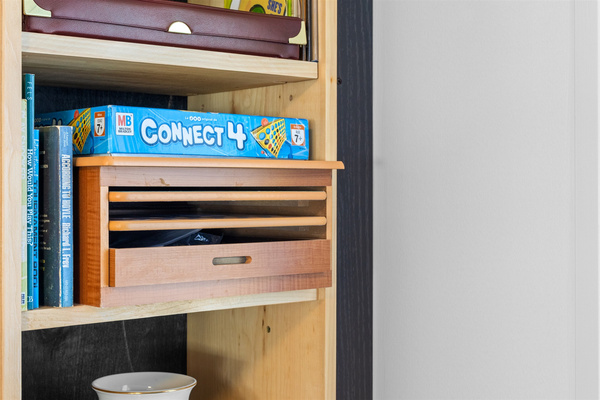 collection of board games, CD's, and 