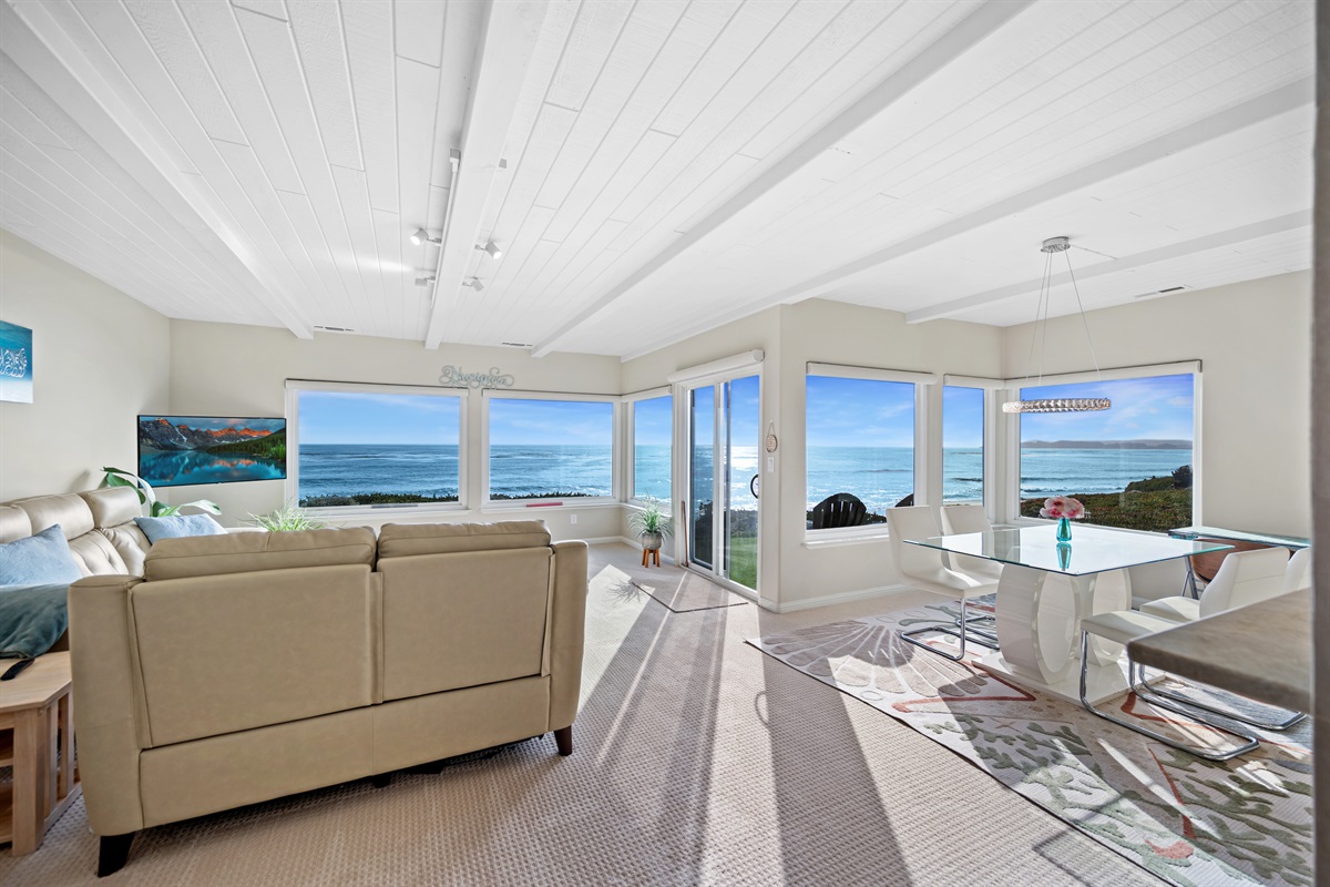 Spacious living and dining room with sprawling ocean views