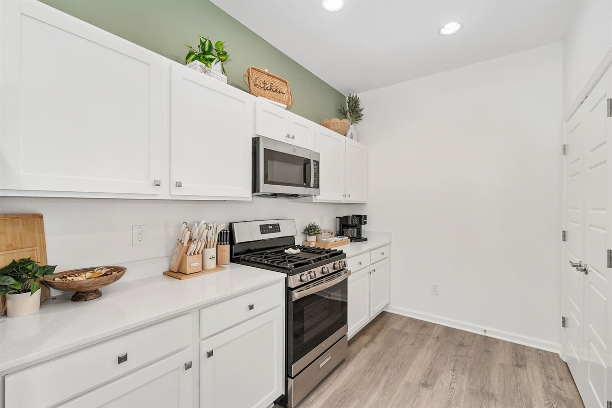 The beautiful and spacious kitchen is fully stocked with all you need and more to prepare meals during your stay!
