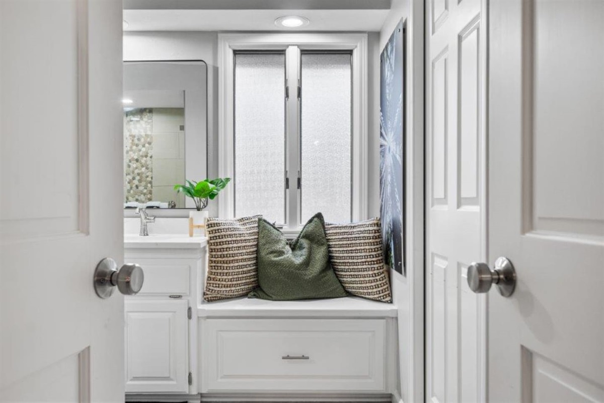 Double Doors open to the Ensuite Bathroom.  The Large Walk-in Closet it to the Right. 