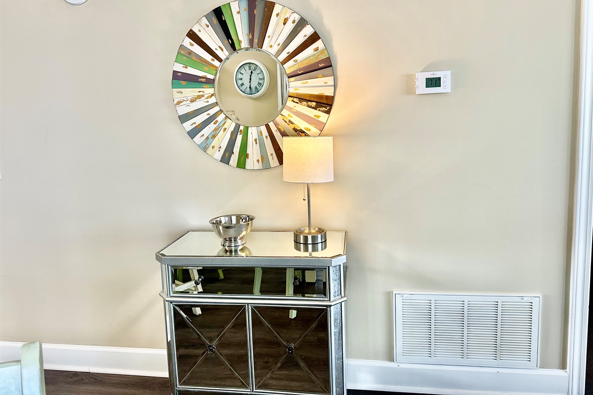 Adjacent to the dining area.  A nice place to drop keys, wallet etc.!