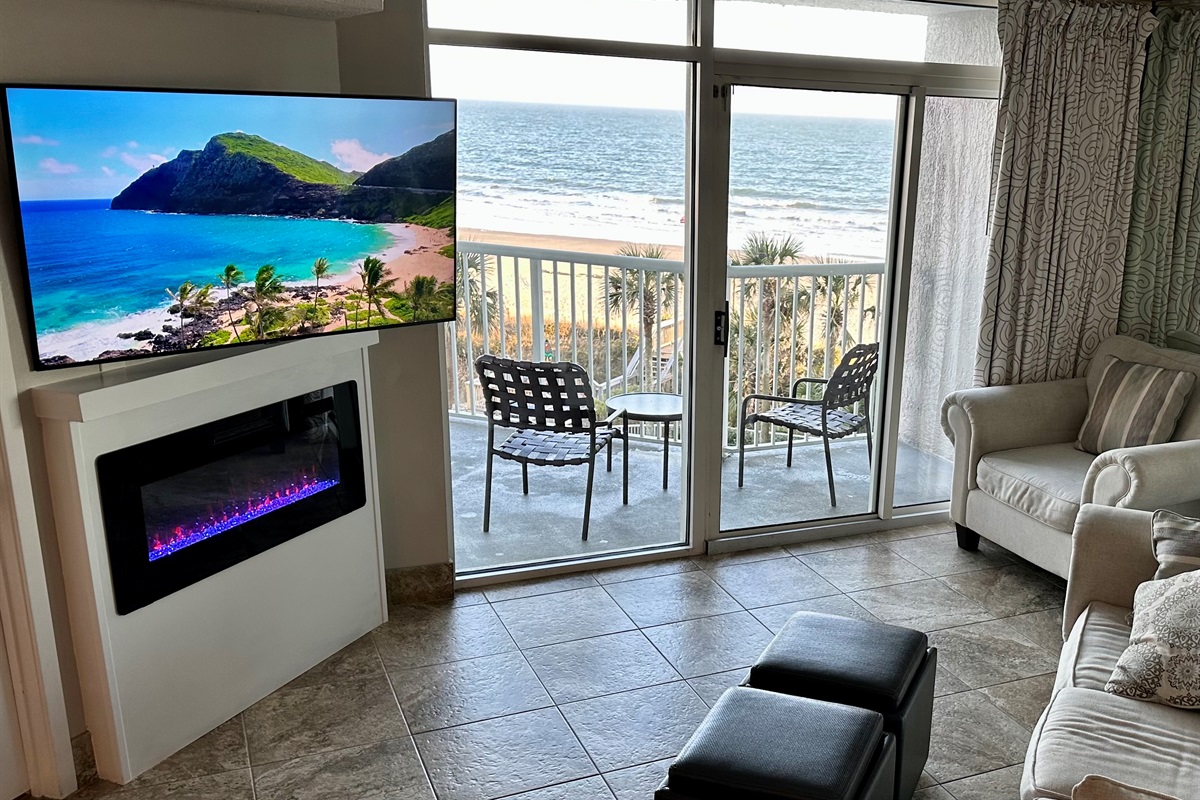 The living room features an electric fireplace & Smart TV w/ full cable lineup.