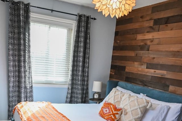 The king bedroom features an ultra-comfy, organic cotton king size mattress.