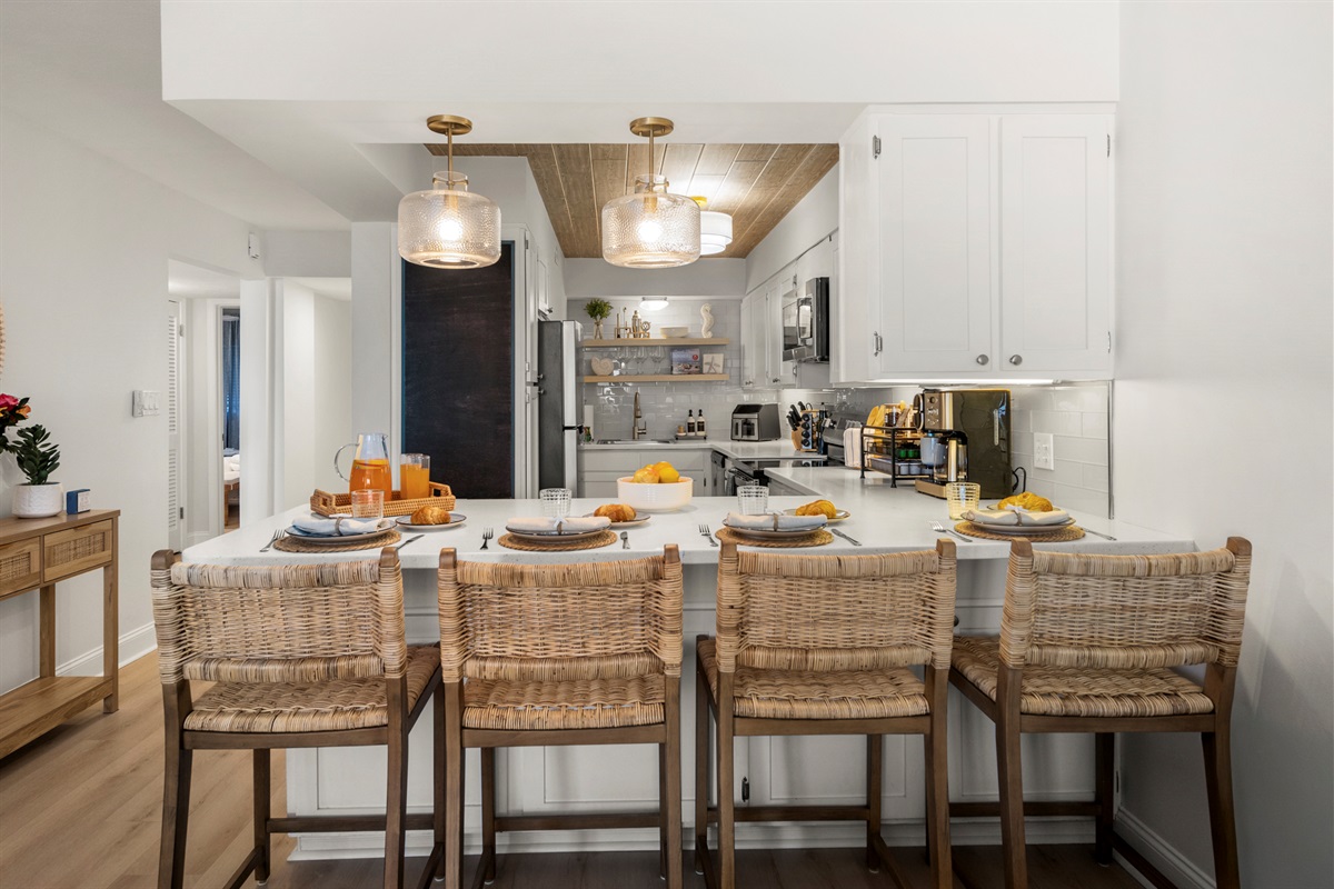 Serve, sip, and socialize at this beautifully designed island, the heart of effortless coastal living.
