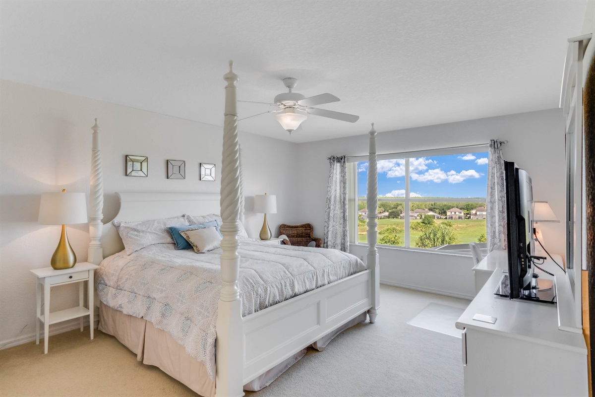 The king master suite with beautiful views of the 16th hole fairway.