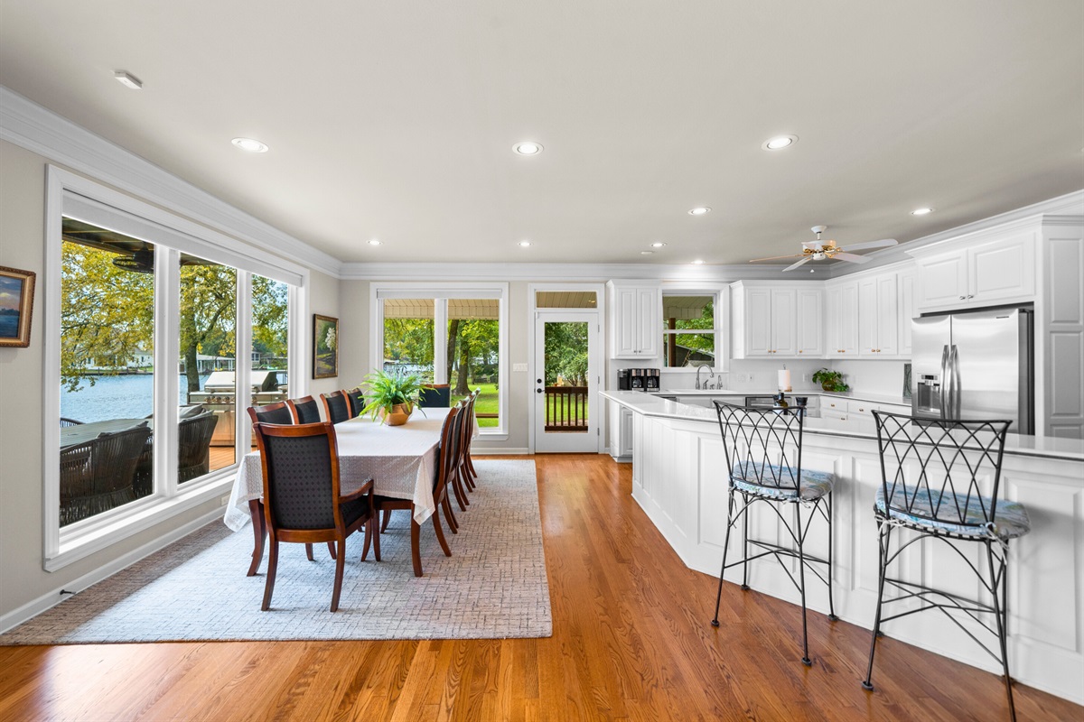 An open floor plan connects dining, kitchen, and views &mdash; perfect for entertaining and relaxing.