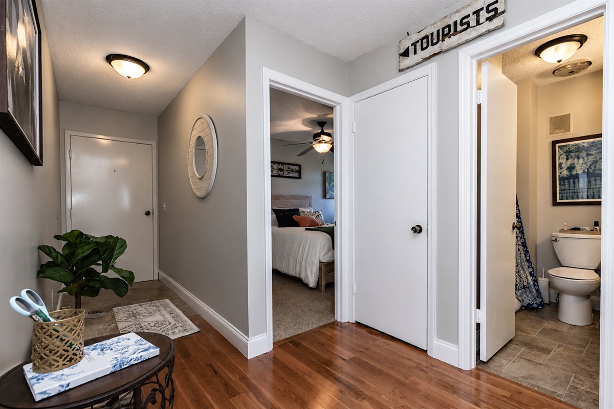 Hallway showing the entry, bedroom and bathroom