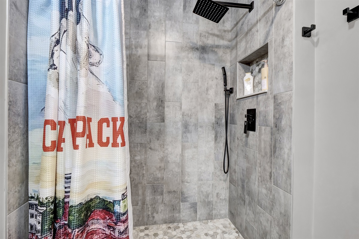 Every bathroom is thoughtfully stocked with premium shampoo and conditioner and a luxury waterfall shower.