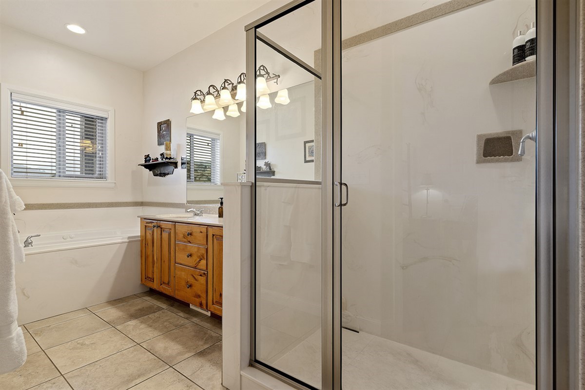 Soak, refresh, and recharge in a spacious, well-appointed bathroom.