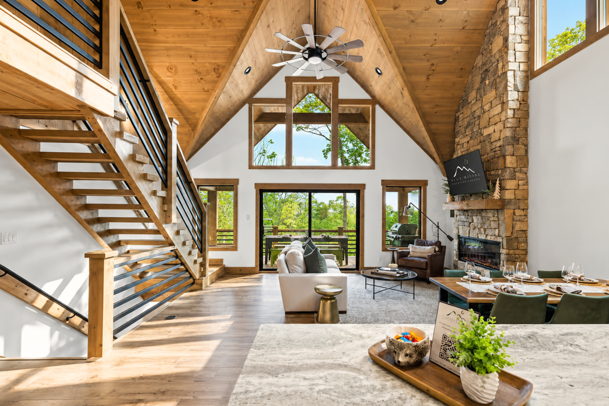 Soak in mountain views through floor-to-ceiling windows in a dreamy open-concept space that&rsquo;s both modern and warm.