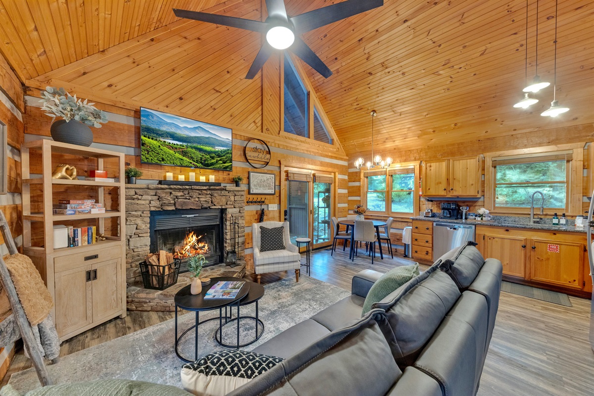 A bright sitting area with a roaring fire makes an ideal spot to relax after a day outdoors
