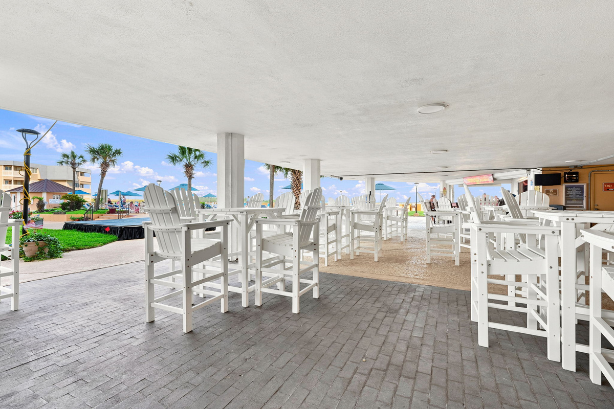 Grab some drinks at the tiki bar by the oceanfront pool