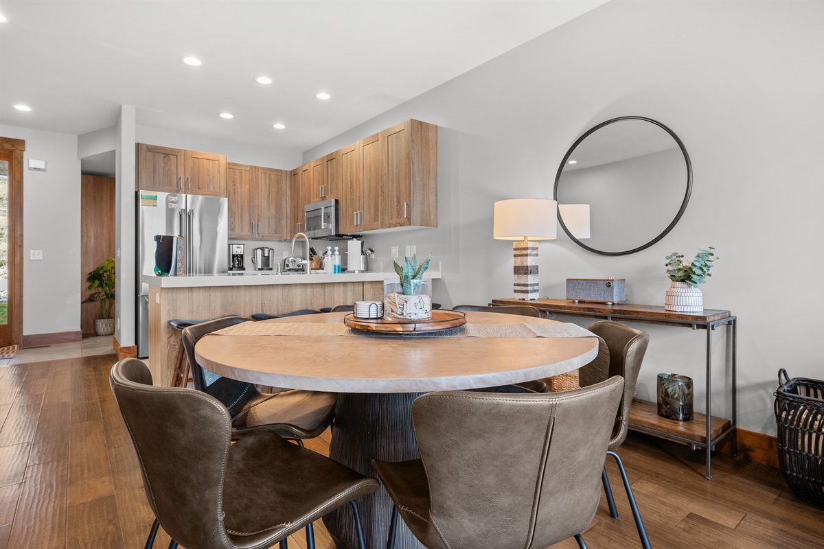 Open dining space with warm finishes and natural light