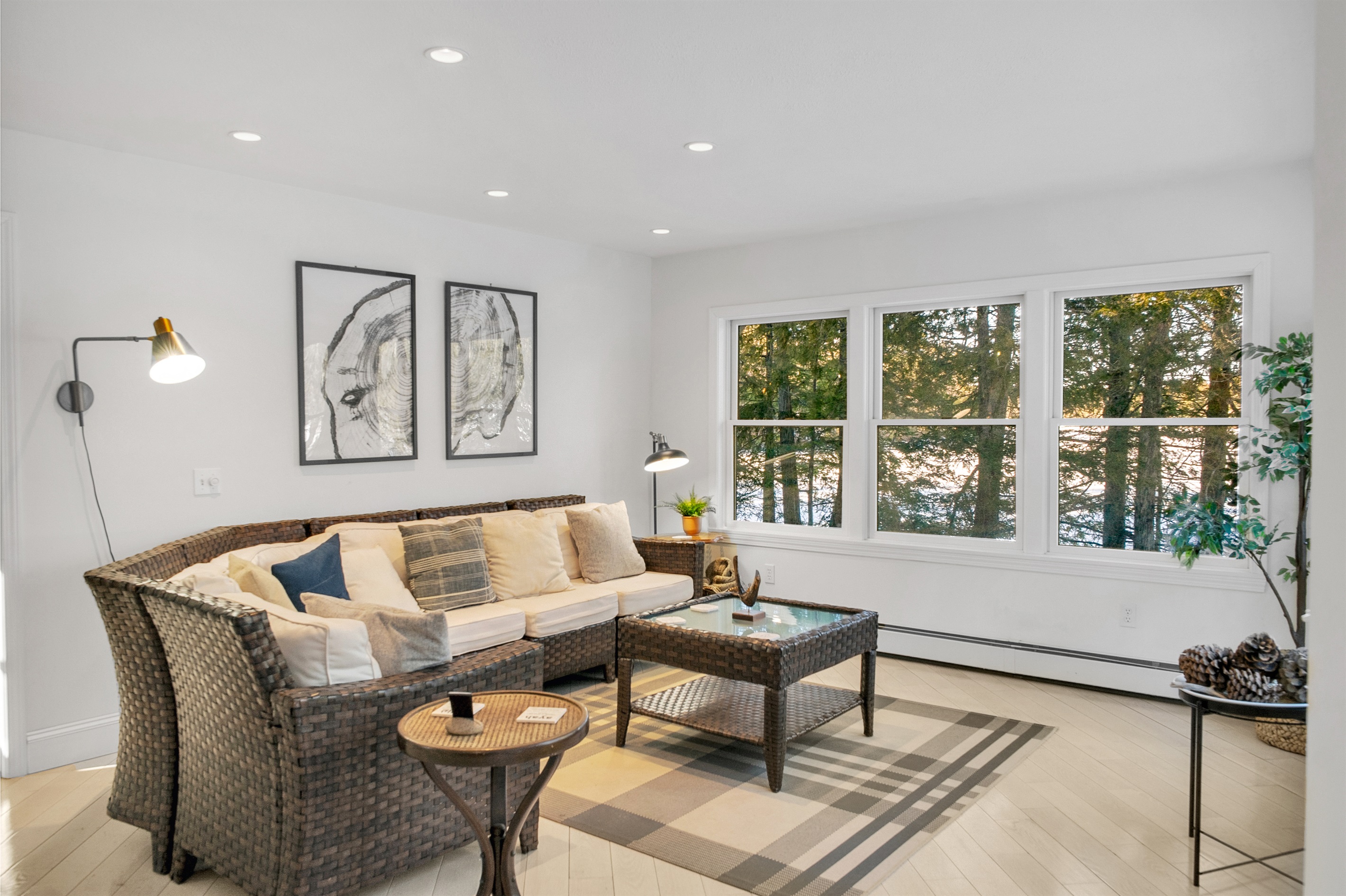 Lakeside sunroom with wall-to-wall pond views