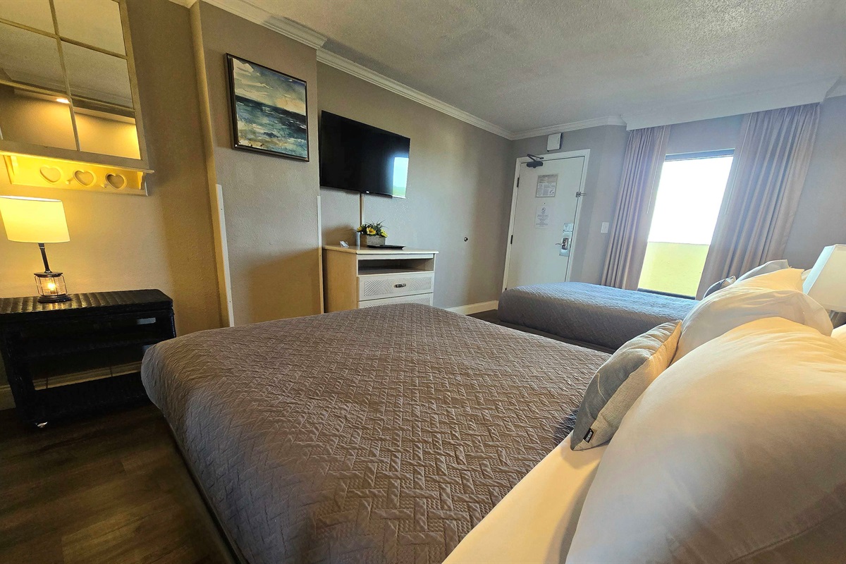 Comfortable bed and inviting bedroom space.