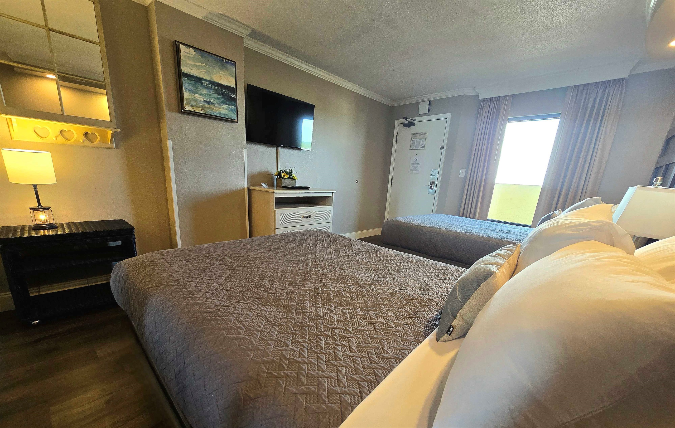 Comfortable bed and inviting bedroom space.