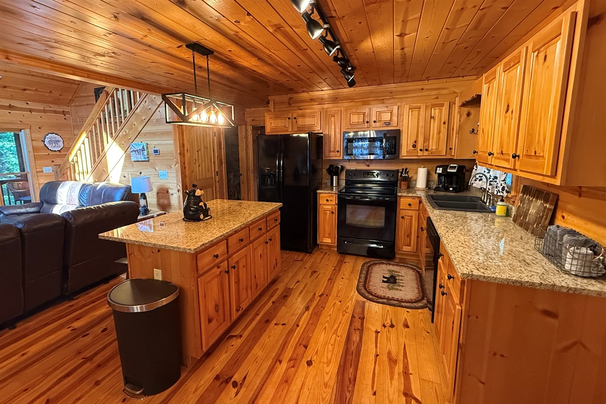 Kitchen is nicely stocked with small applinaces, cook ware, spices, coffee and many more goodies!