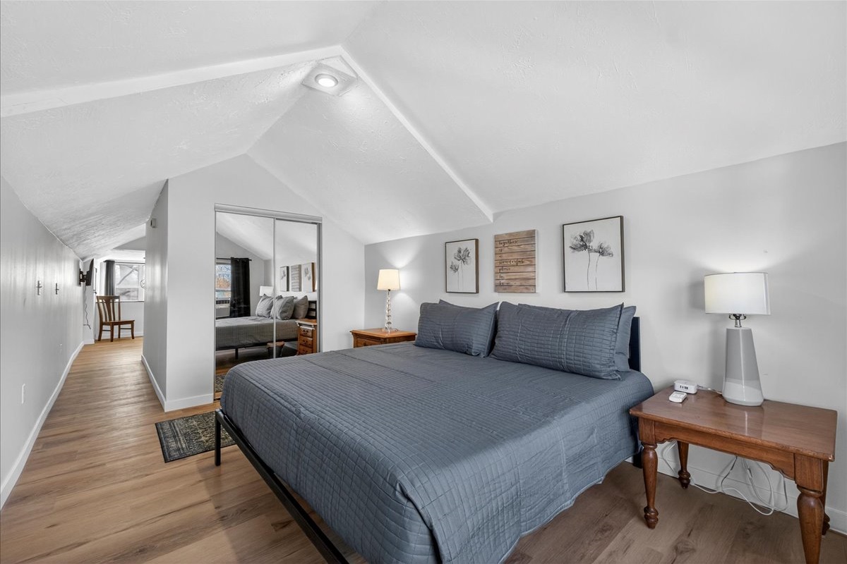 Wake up to sunlight and a lovely view in this third, second-story king bedroom, separated from the twin room by a hallway.