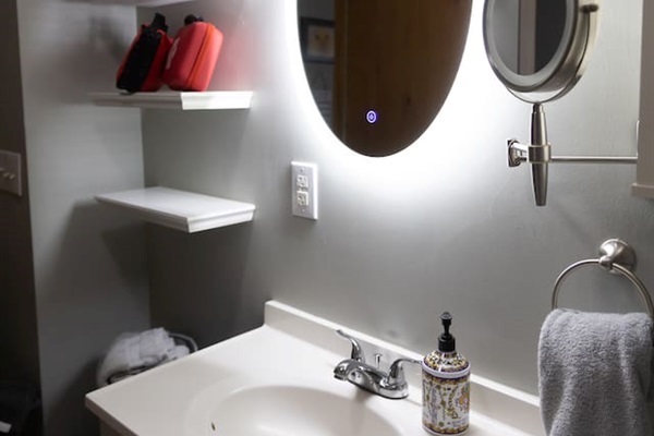 Large mirror with full-spectrum lighting.