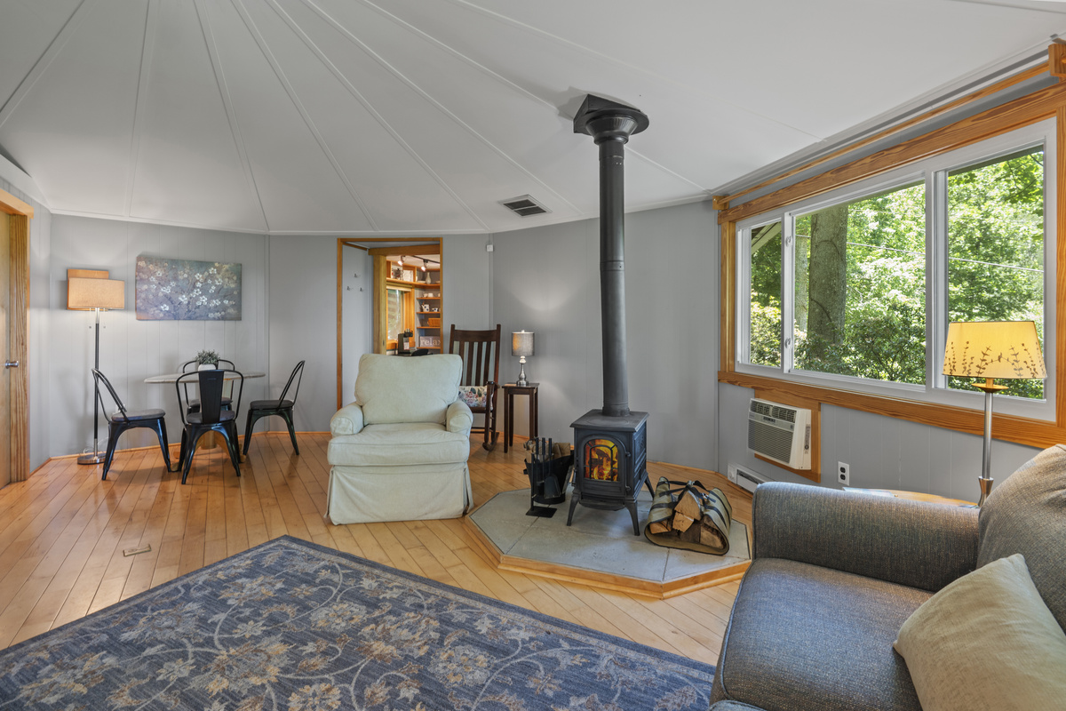 Cozy, yet open living area; we stock supplies for the woodstove in winter
