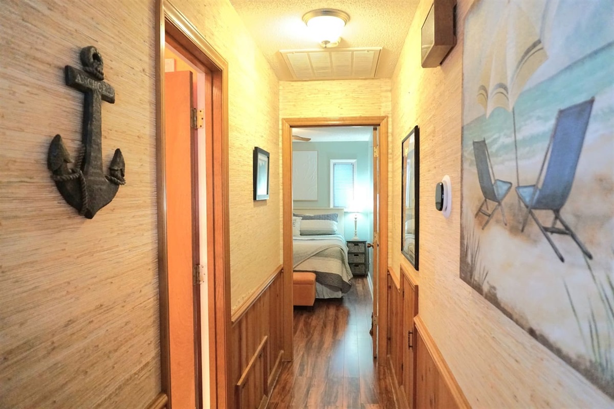 Hallway to Main Bathroom & Bedroom 1