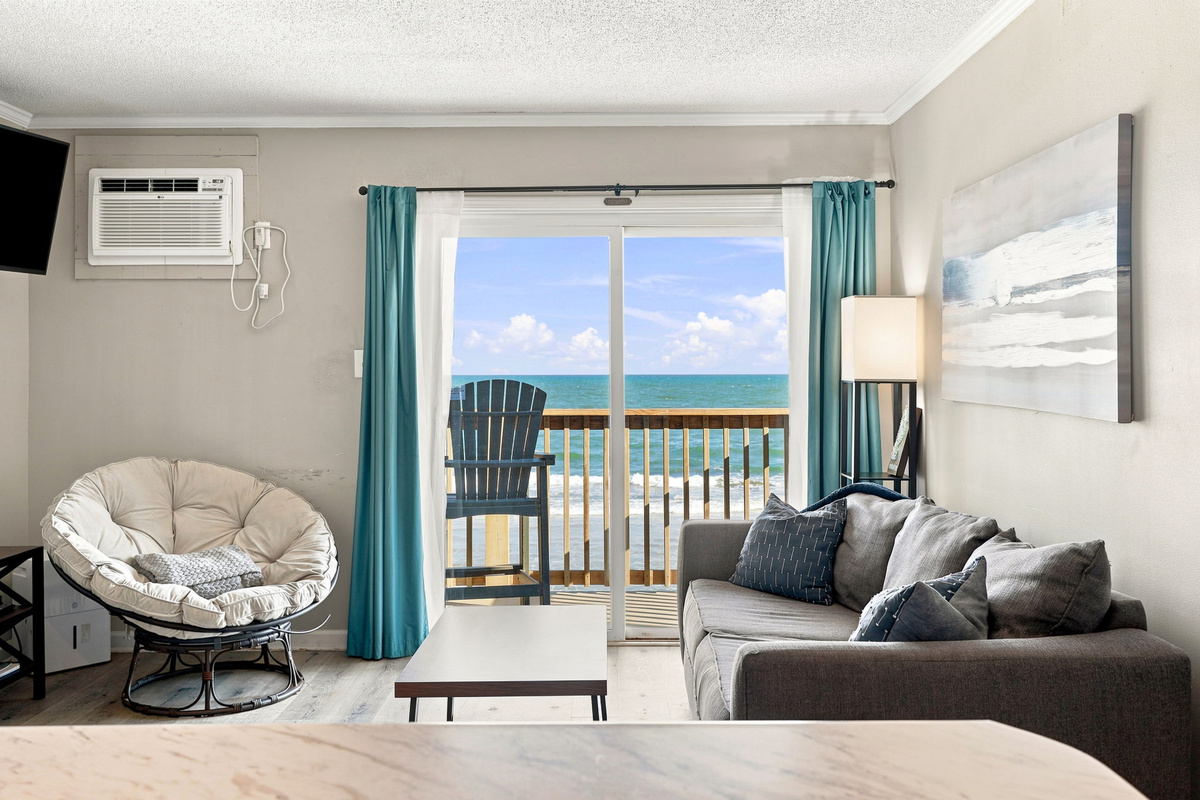 Settle in and take in the scenery with a bright, relaxing space designed for oceanfront mornings and peaceful evenings