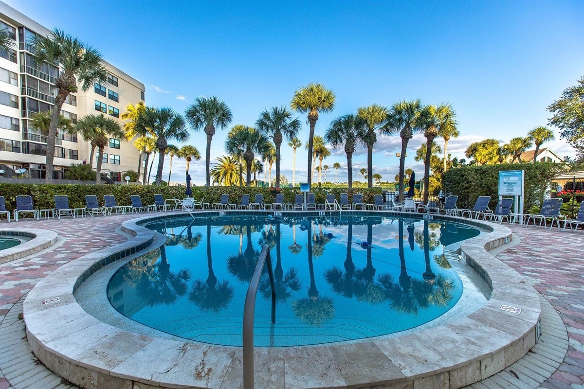 Poolside palm trees bring that Florida resort feel home.