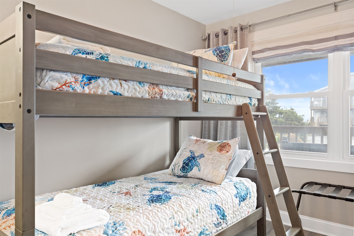 Coastal-themed bunk beds perfect for sleepovers after a beach day