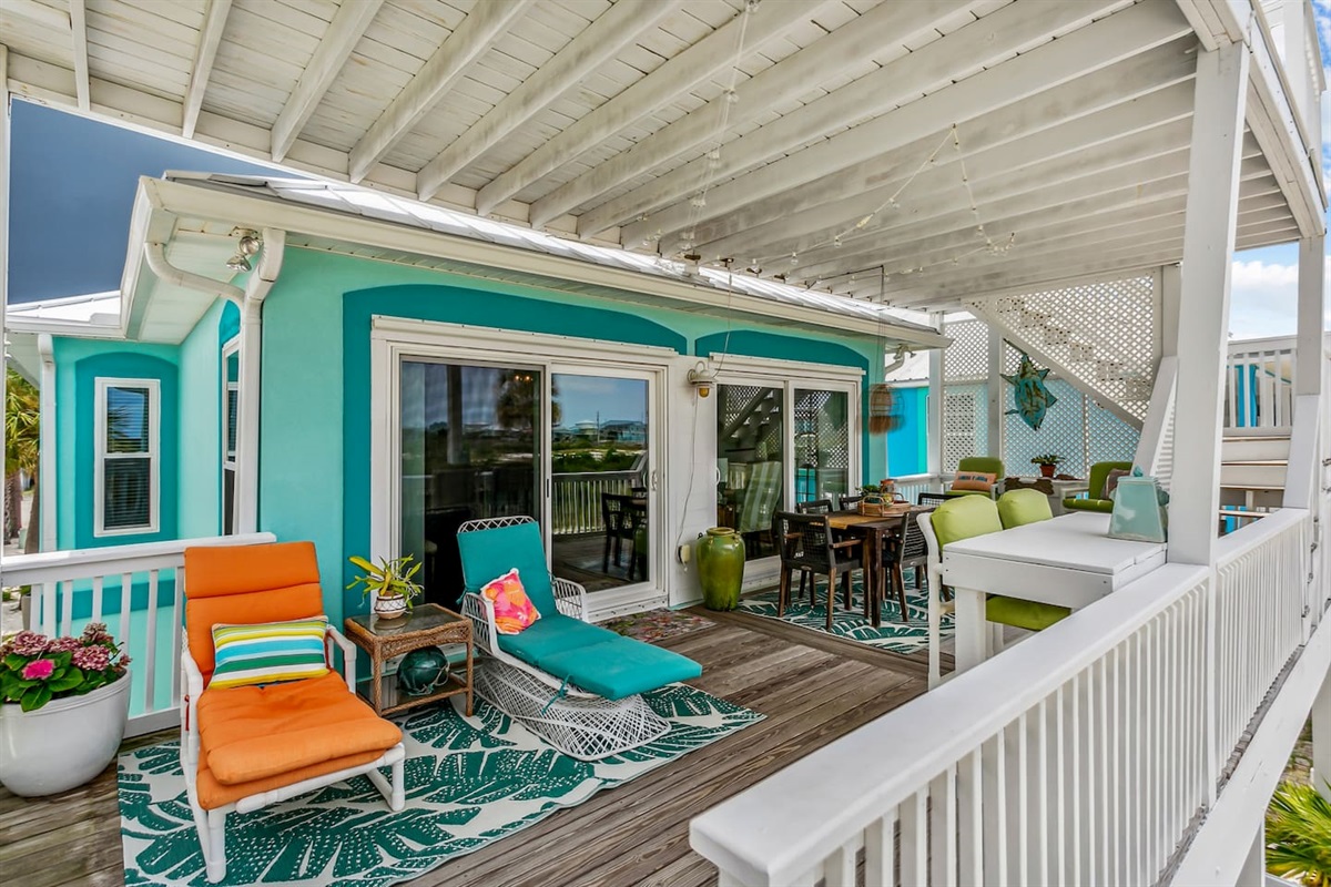 Upgraded with a newer dining table and 4 chairs and a lounge type sitting area    Moved the table in this picture to below the deck so it can still be used by guests 