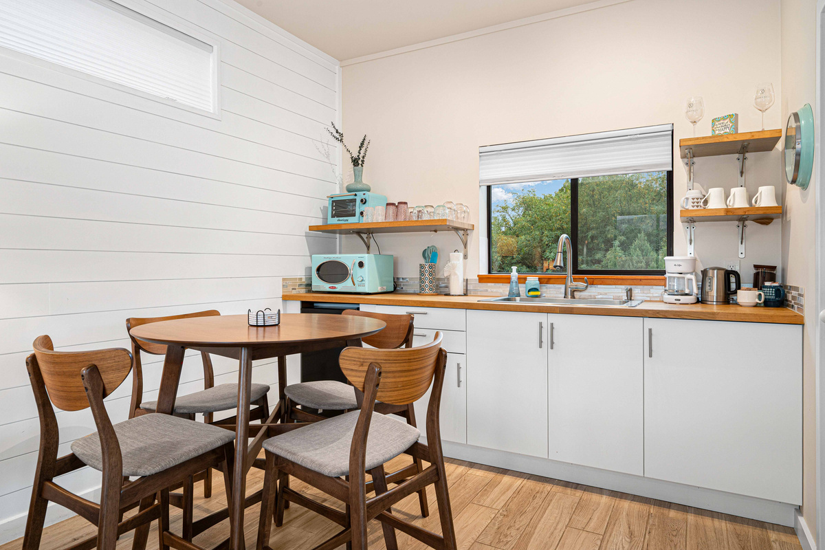 {Casita Kitchenette} Casita kitchenette with mini fridge, coffee station, and essentials.