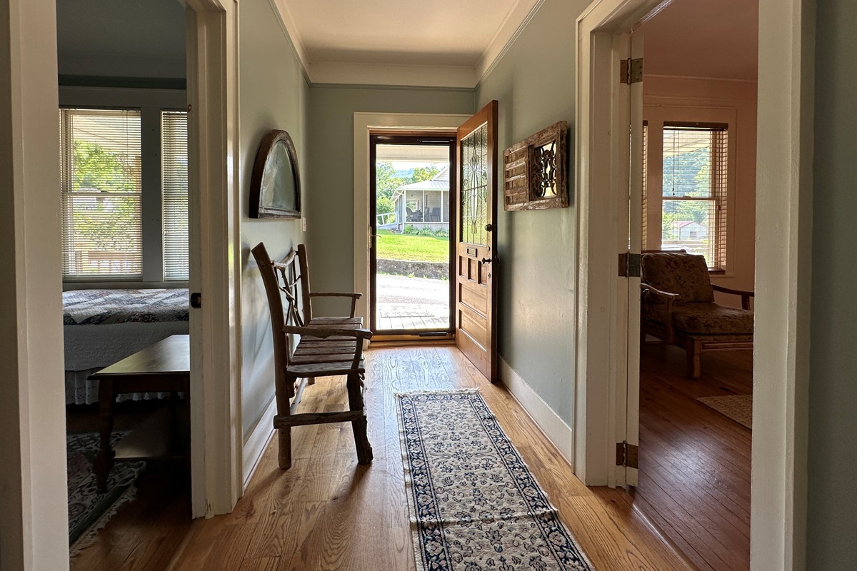 Front door to the house with the queen bedroom on the right and the twin bedroom on the left