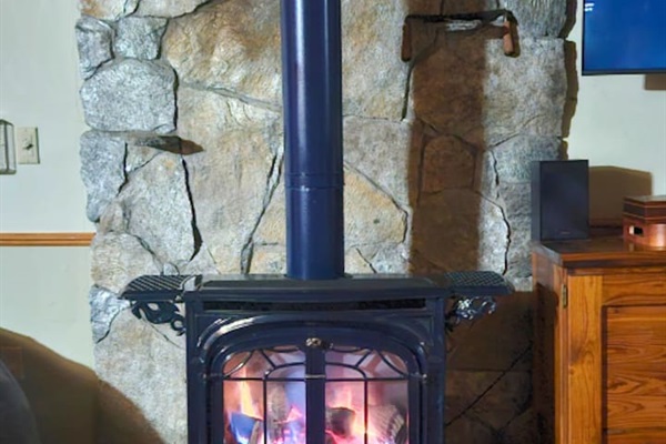 Cozy up next to this beautiful stove after a soak in the hot tub on a cold night! 