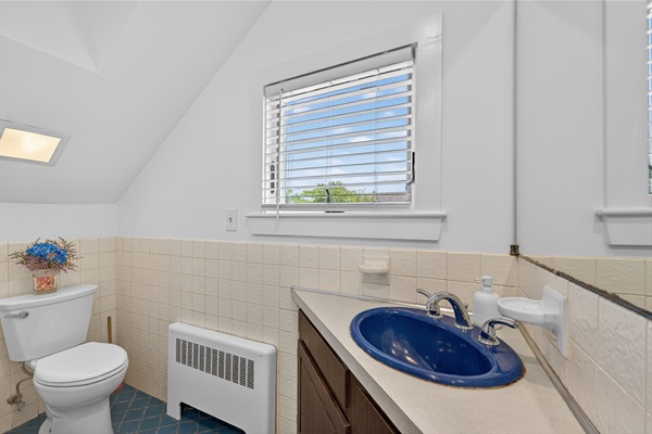 Full spacious bathroom designed for comfort and convenience with ample space and essential amenities.
