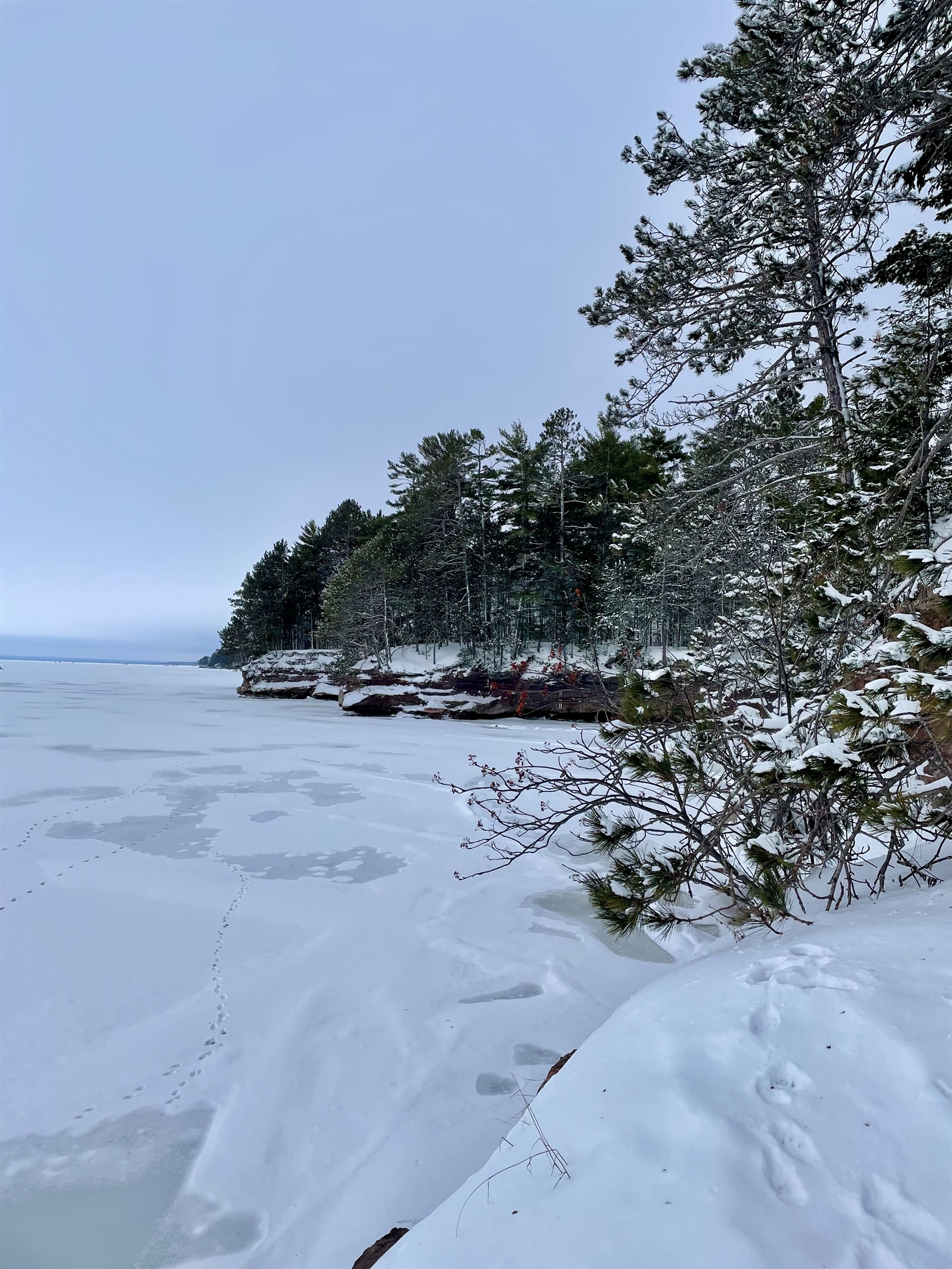 Houghton Falls Trail in Washburn, WI a 20 min drive from the cottage. A 30 minute hike with seasonal waterfalls, sandstone cliffs, and runs to the shoreline of Lake Superior with sea caves. 